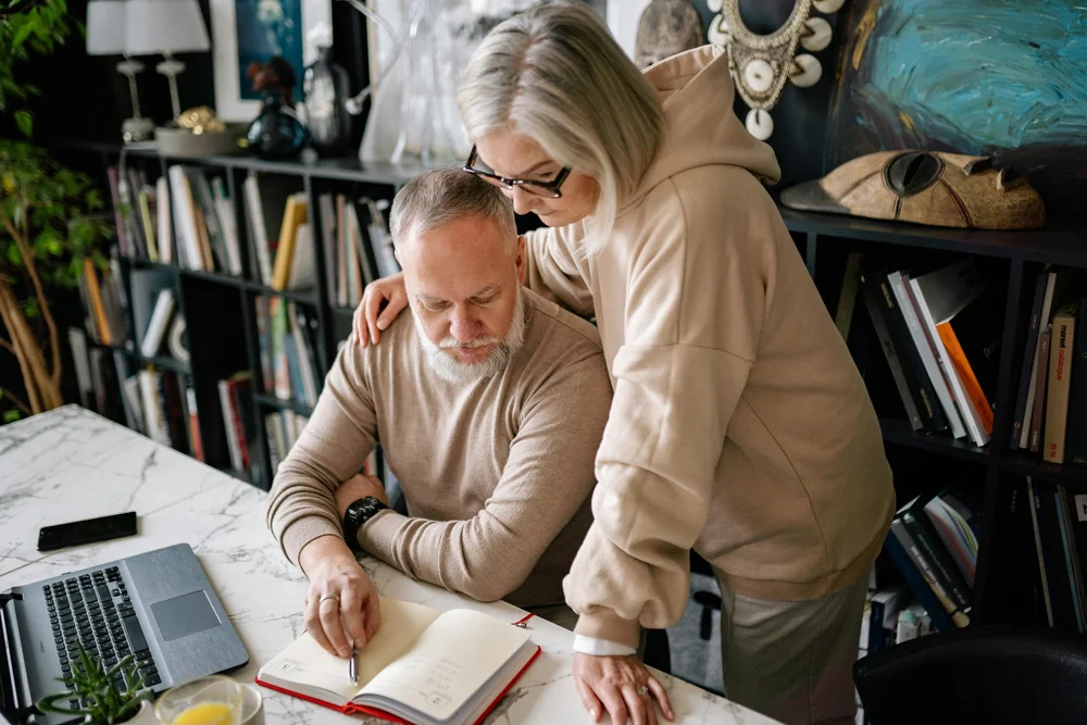 A couple spending a thoughtful moment together at home